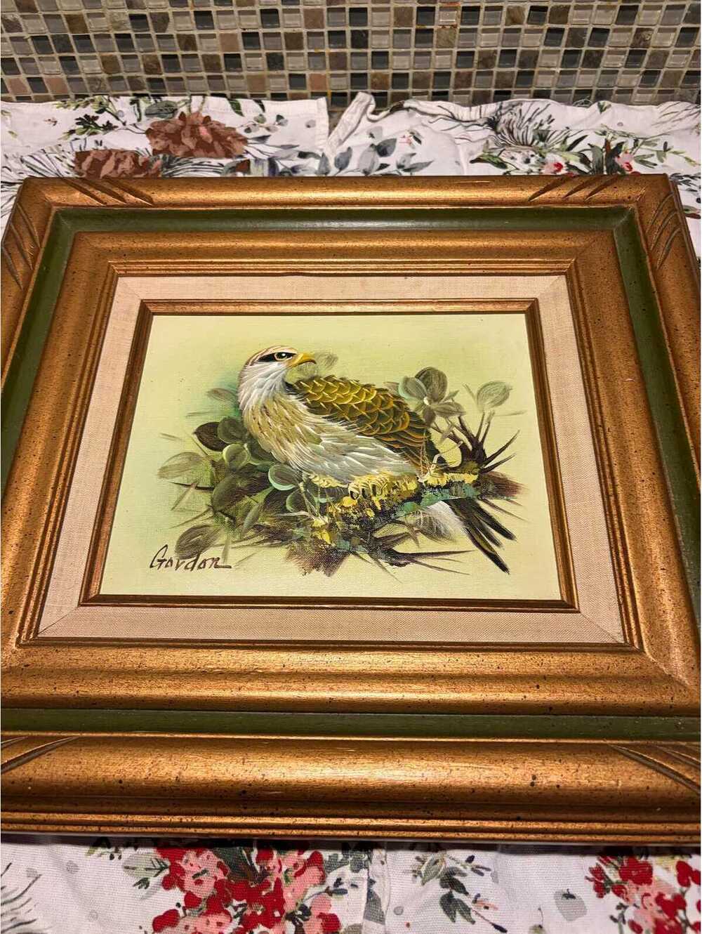 This is a mid-century vintage oil painting of a hawk by Gordon.